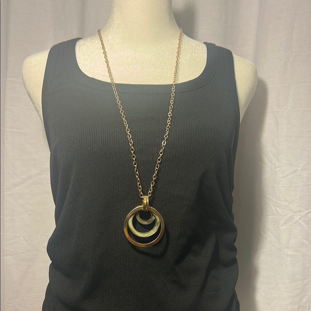Elegant Gold and Silver Pendant Necklace